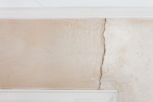 evaluate imperfections before painting walls